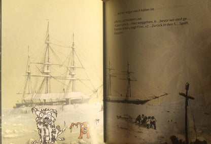 Open book with illustrations of ships and characters on a wooden surface